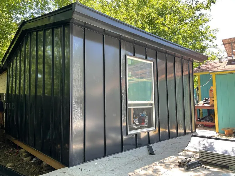 Black standing seam metal wall panels for Roof Inspection in Kennedy