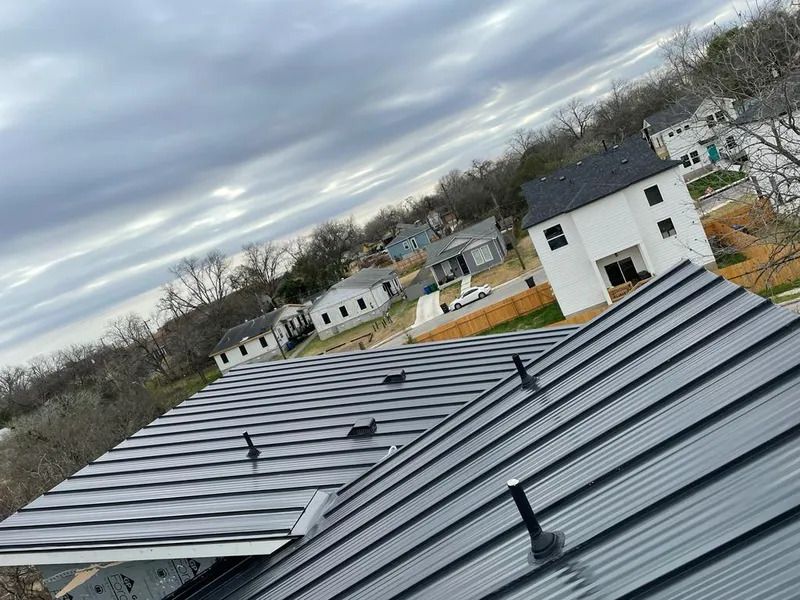 Standing seam metal roof panels with vents for Skylight Repair in Kennedy